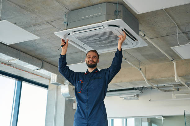 AC technician servicing unit